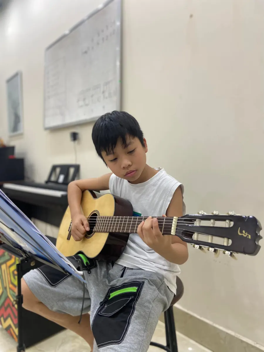 Trung tâm học đàn 123 - Lớp Học Piano, Guitar, Organ